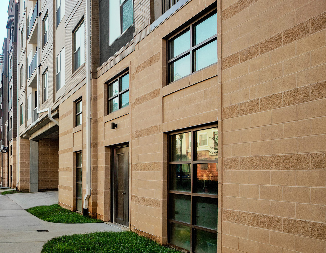 1100 South Apartments in Charlotte, NC featuring Prestige Masonry Architectural Block - Smooth Face in Shoreline Sand
