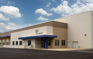 CLT Fleet Facility in Charlotte, NC featuring Prestige Masonry Architectural Block Smooth Face in Ivory Coast and Braxton Beige; Split Face in Luminous Sea Salt; and Johnson Concrete Products Lightweight Gray ProBlock