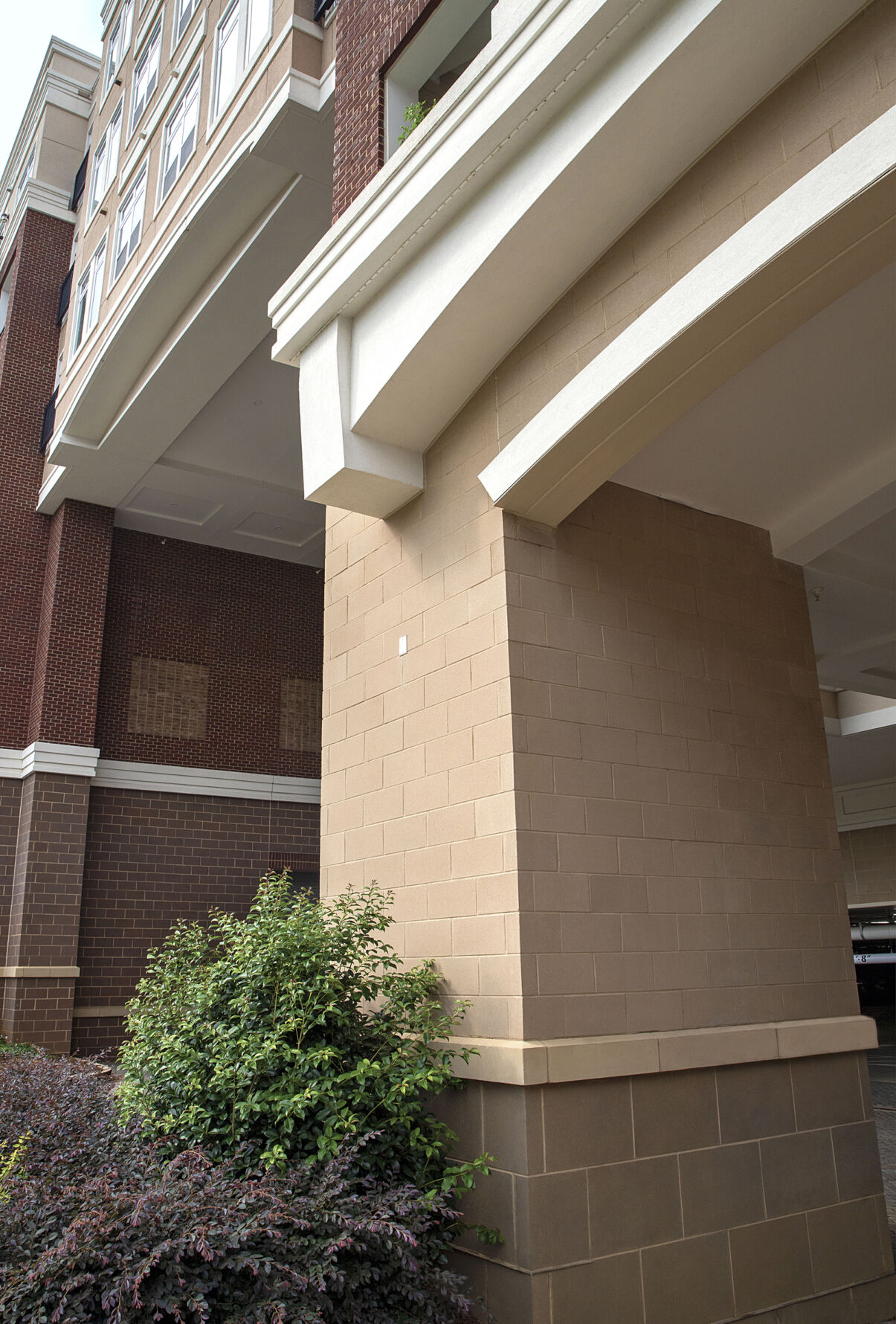 The Lincoln at Dilworth in Charlotte, NC featuring Prestige Cast Stone - Smooth Face in Basalt and Smoky Quartz