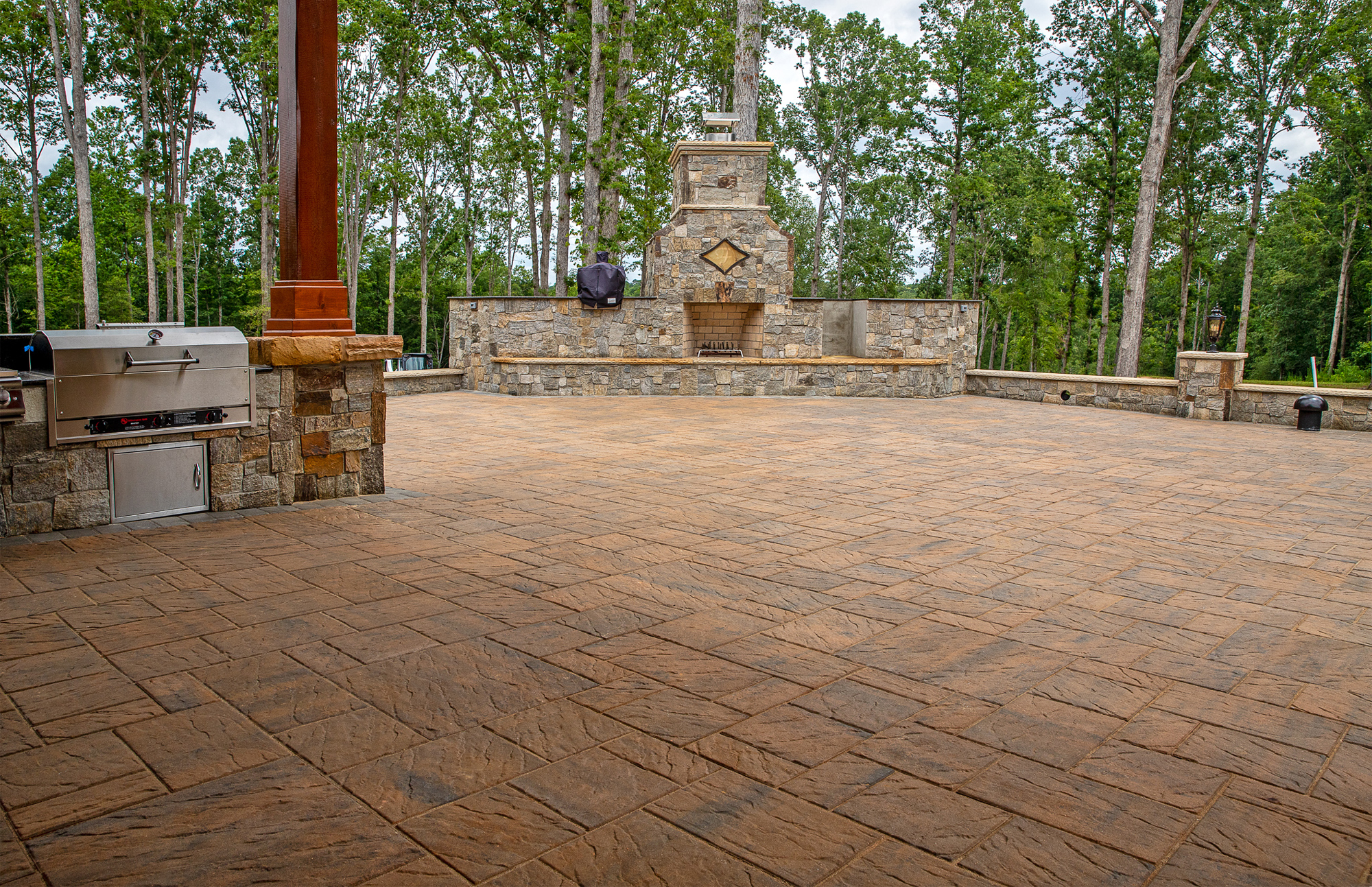 Spectacular backyard featuring 7,000 sq ft of striking concrete pavers ...