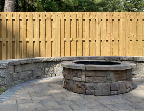 Keystone pavers and a seat wall bring style & function to this outdoor living space