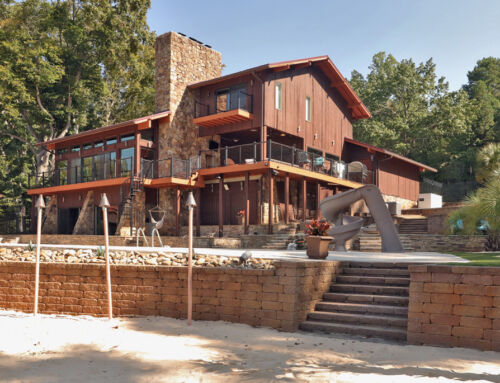 VERSA-LOK retaining walls transform this lakefront property into a tiered, resort-style backyard retreat