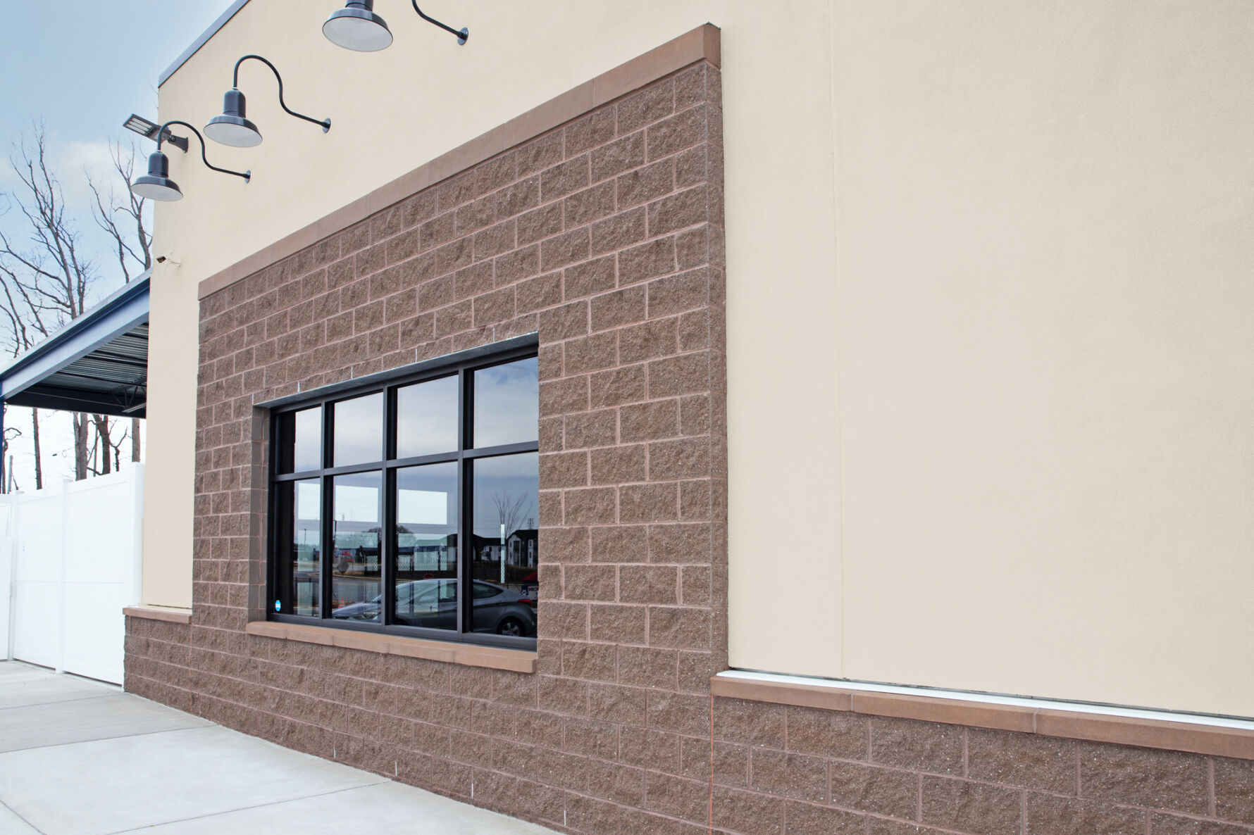 All American Pet Resorts building built with Johnson Concrete Products lightweight CMU and Prestige Masonry split face architectural block.