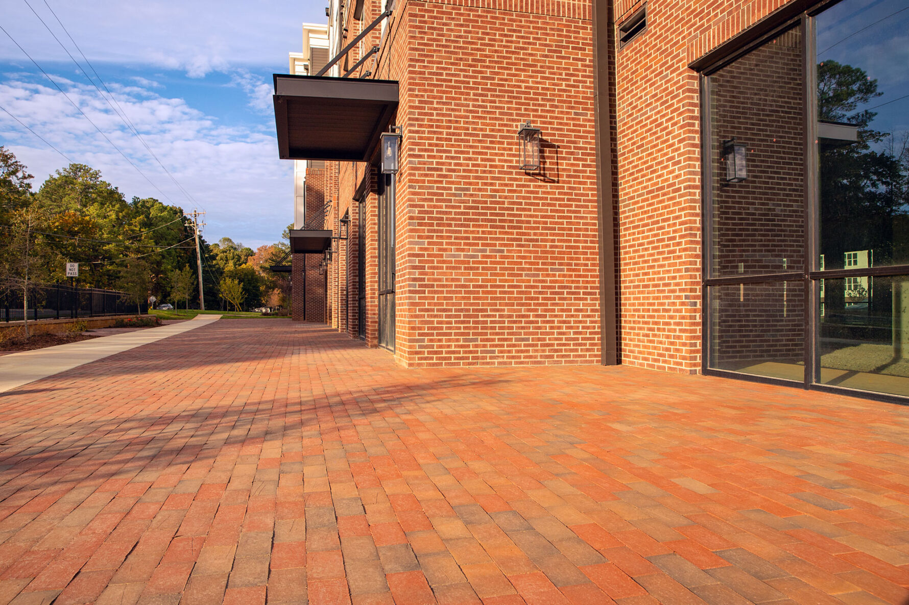 Brick paver walkway and brick veneer exterior at Peterson Station at Sunset Lake in Holly Springs, NC.