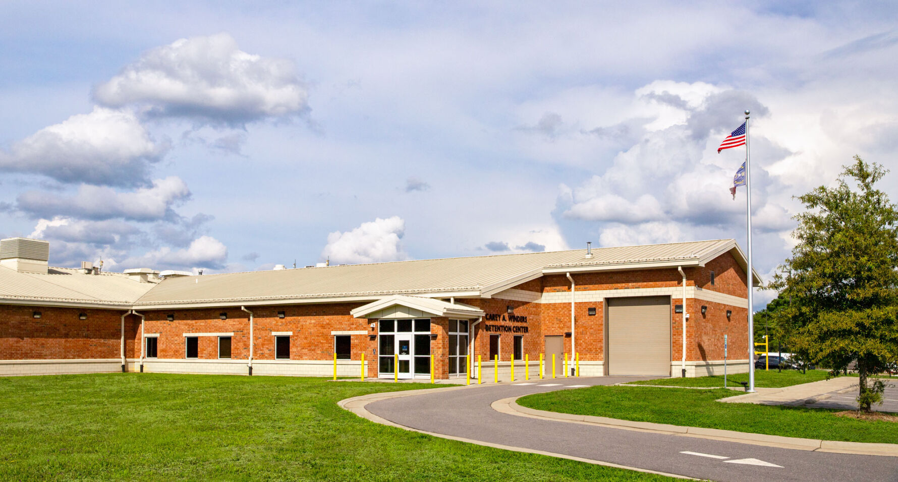Carey A. Winders Detention Center entrance featuring Ground Face architectural block in Cave of Crystals and load-bearing masonry construction.