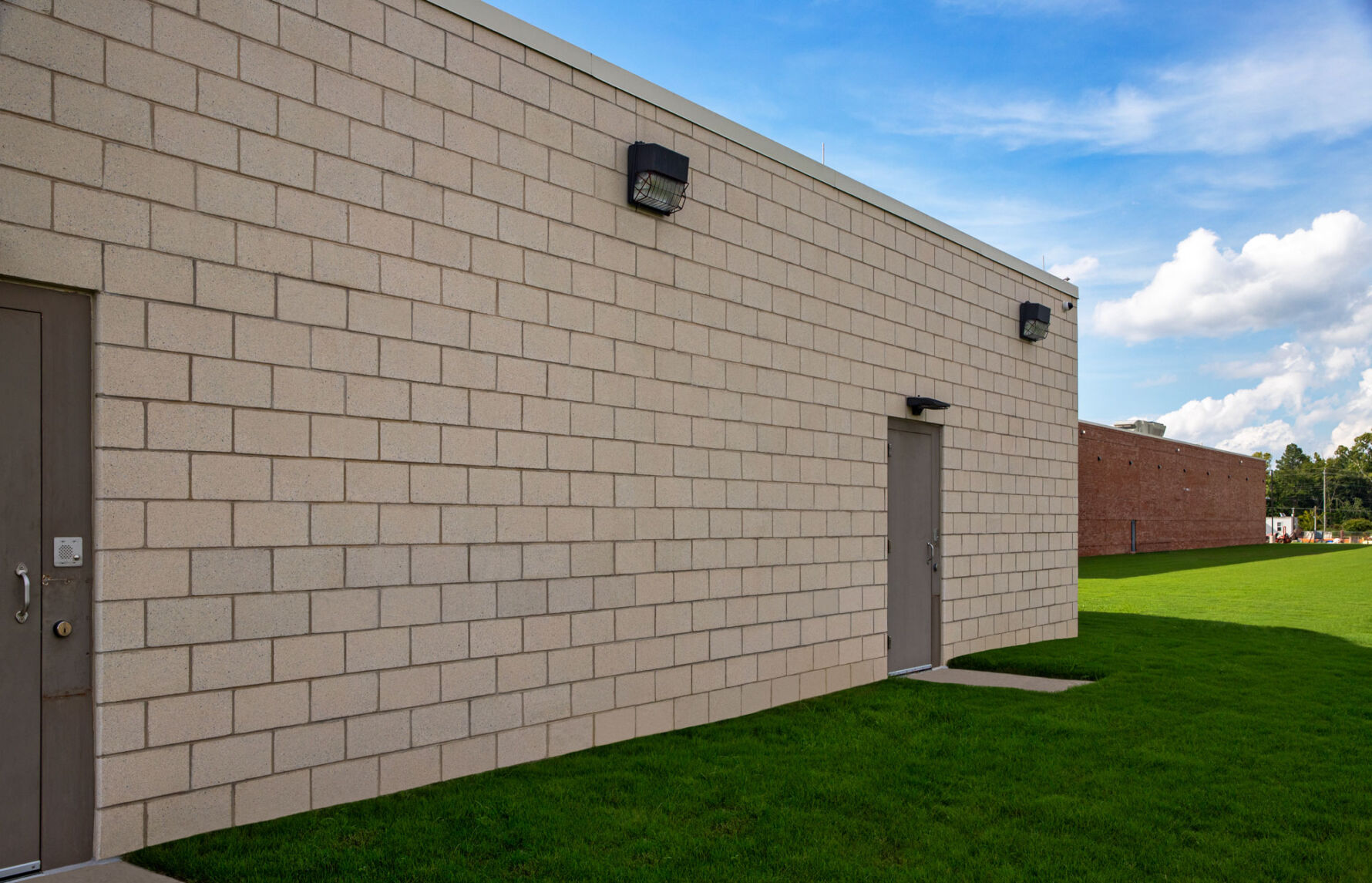 Exterior view of Wayne County Detention Center in Goldsboro NC showcasing custom architectural concrete masonry and detention facility design.