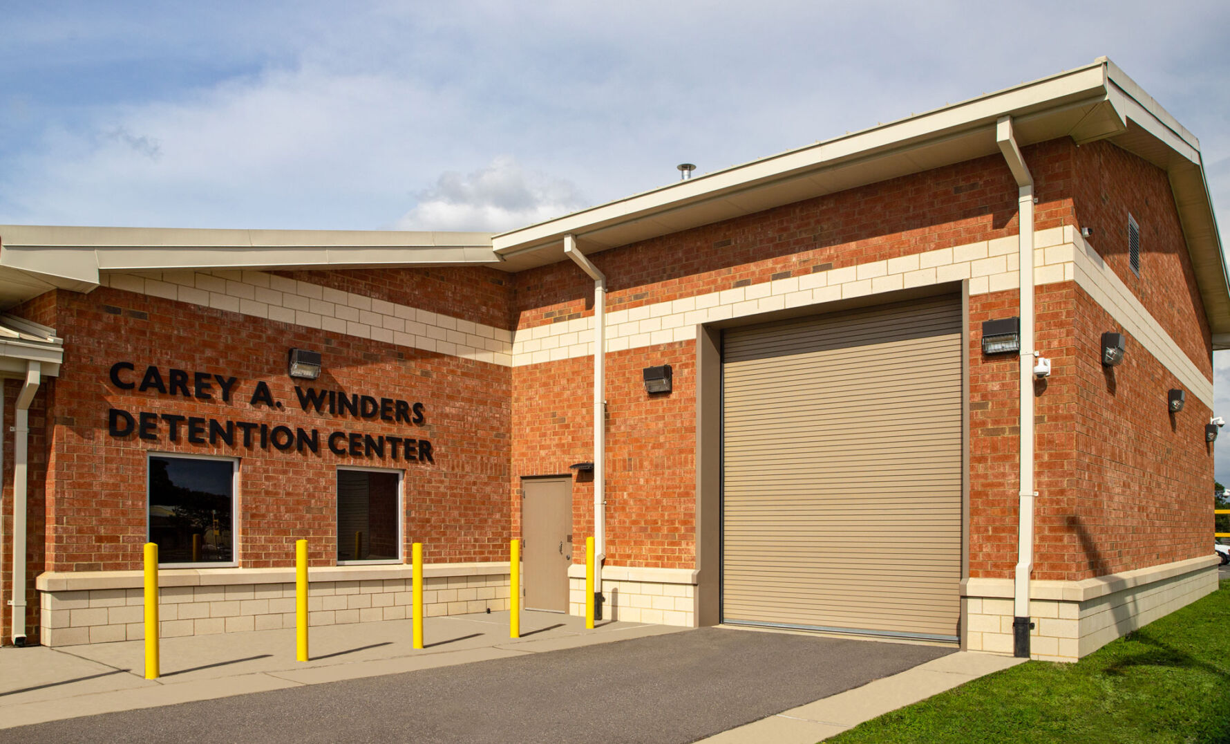 Custom Ground Face architectural block with contrasting concrete masonry accents at Wayne County Detention Center.